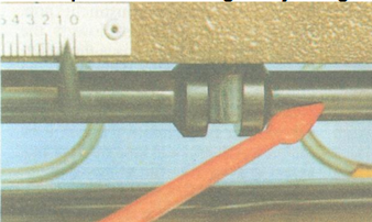 Top feed roller adjusting shaft